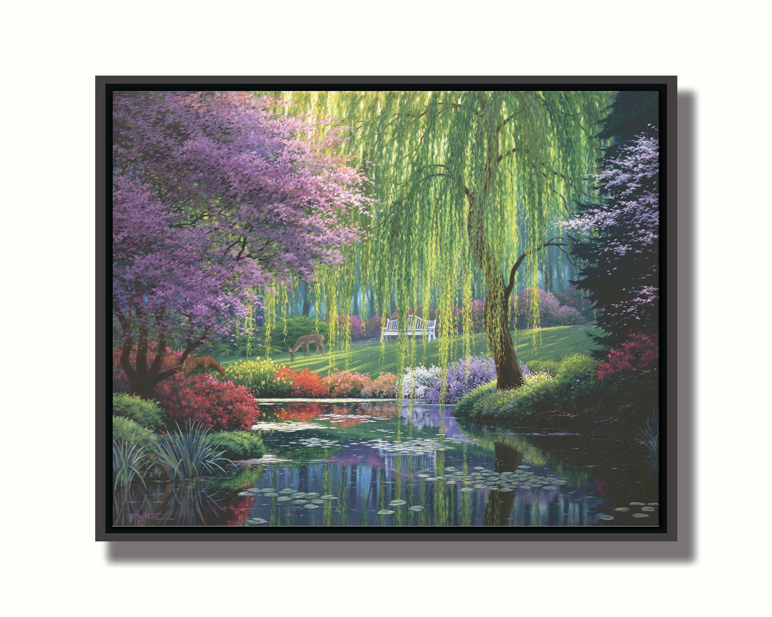 A painting of a garden pont, reflecting the surrounding scenery. Trees blossoming in pink grow with willows alonside the pond, as well as bushes of flowers in pink, red, yellow, white, and purple. Deer graze on the grass in the background, in a clearing with a white bench. Printed on canvas in a float frame.