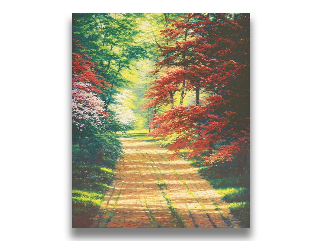 A painting of a dirt path through a spring woodland. Vibrant green trees grow alongside red japanese maples and pink and white blossoms. Printed on canvas.