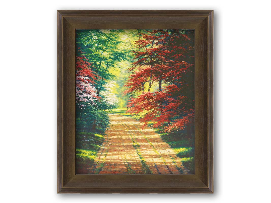 A painting of a dirt path through a spring woodland. Vibrant green trees grow alongside red japanese maples and pink and white blossoms. Printed on canvas and framed.