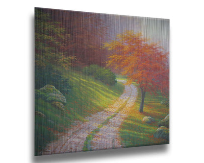 A painting of a gravel road winding around a hill between autumn trees. Printed on metal.