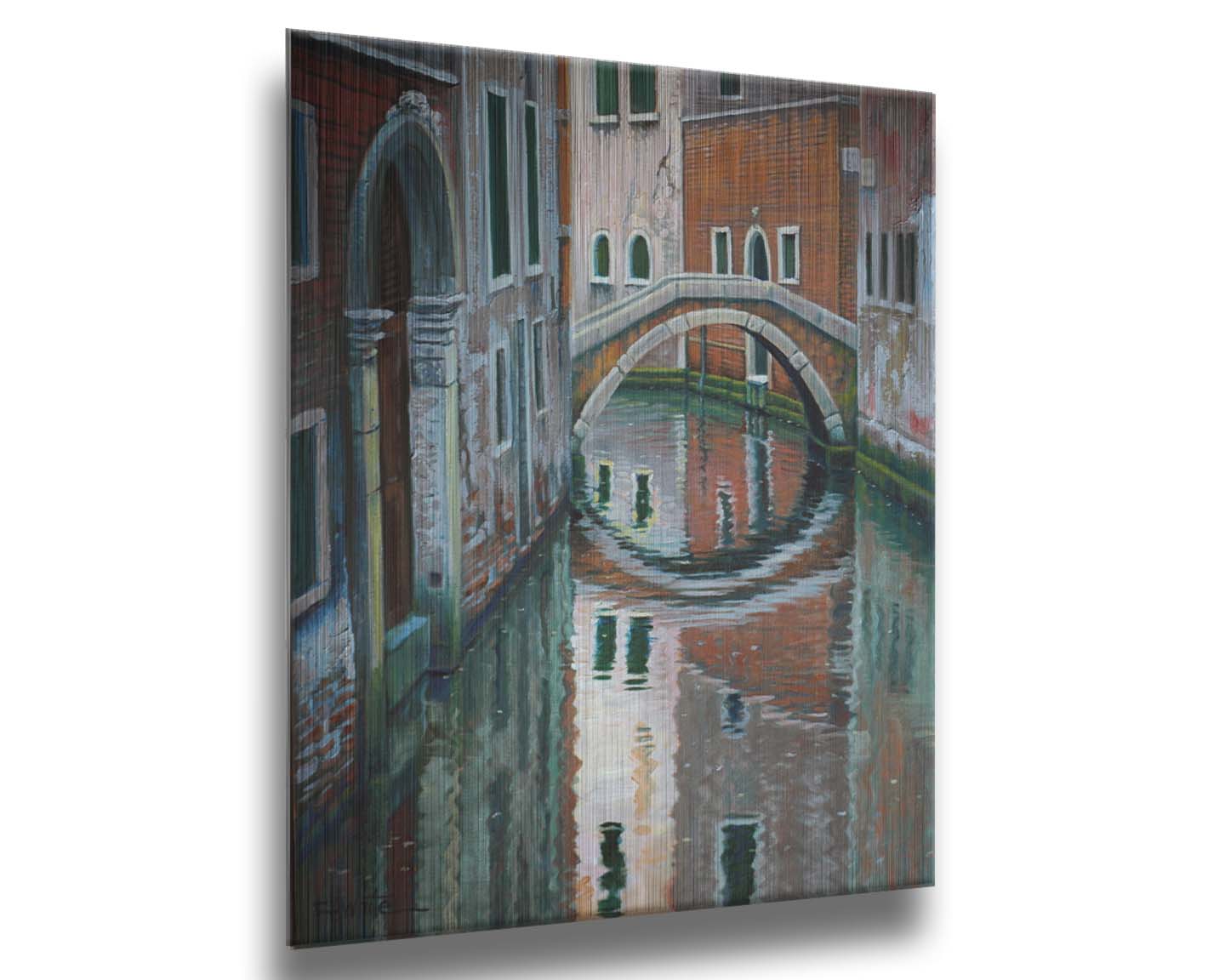 A painting of a Venice canal alleyway, passing under a bridge between old brick buildings. Printed on metal.