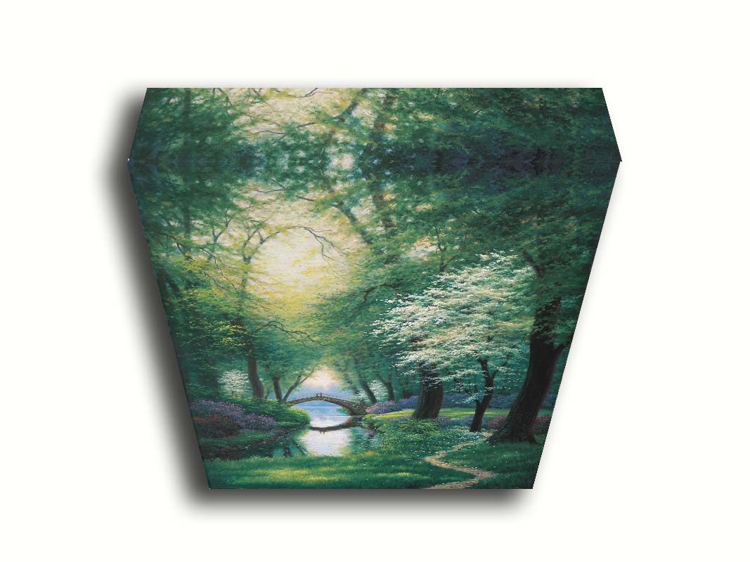 A painting of a path through a forested park in spring, running alongside a stream to a bridge. Printed on canvas.