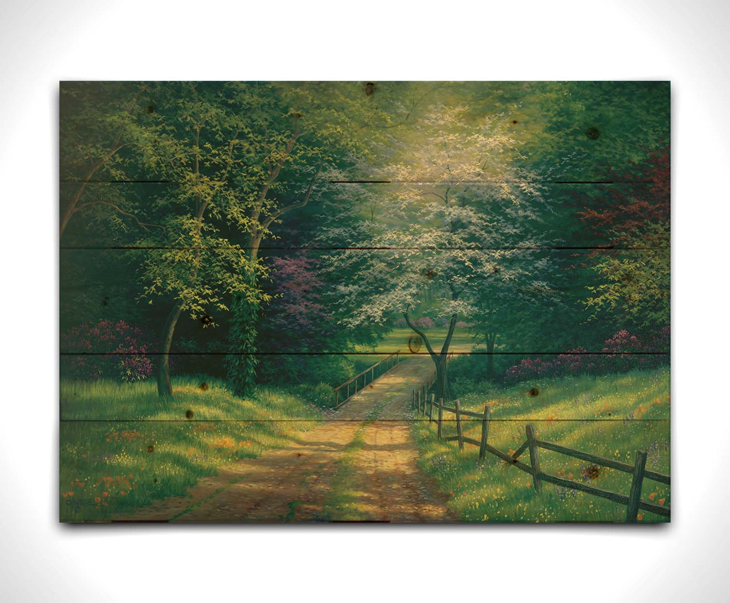 A painting of the view down a dirt road, surrounded by grass, wildflowers, and the colorful trees of spring. Light peeks through the branches, highlighting the road and connecting bridge. Printed on a wood pallet.