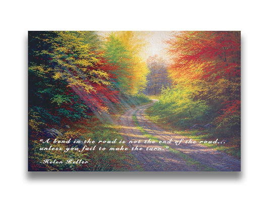 A landscape painting of a gravel road winding thorugh an autumn forest with a mix of vibrant red, yellow, and green leaves. The Helen Keller quote "A bend in the road is not the end of the road... unless you fail to make the turn" is overlaid in white across the bottom. Printed on canvas.