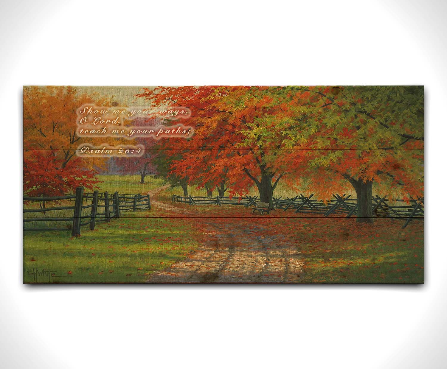 A painting of a road winding through a fenched field, surrounded by multicolor fall maple trees. Printed on a wood pallet.