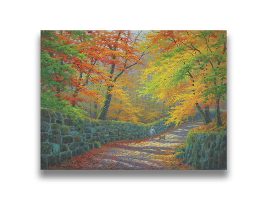 A painting of a stone road through a forest. It is bordered by stone walls on either side. The leaves of the trees are changing colors and dropping to the ground for fall. A person can be seen walking a leashed down further down the path. Printed on canvas.