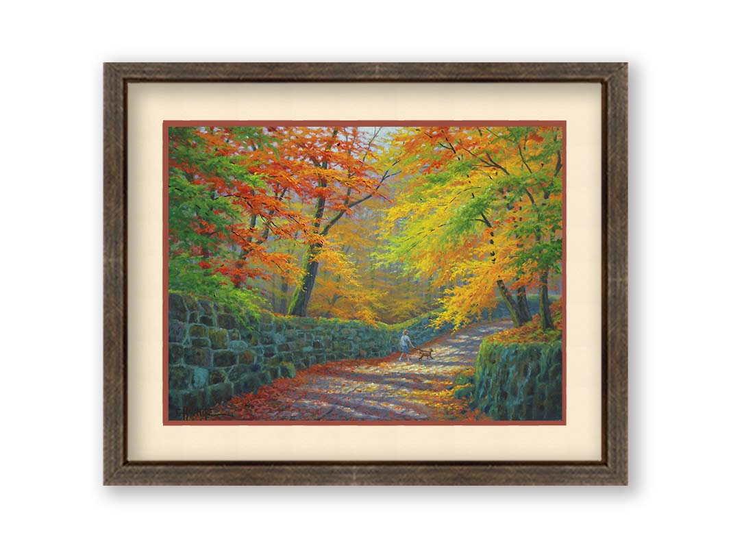 A painting of a stone road through a forest. It is bordered by stone walls on either side. The leaves of the trees are changing colors and dropping to the ground for fall. A person can be seen walking a leashed down further down the path. Printed on paper, matted, and framed.