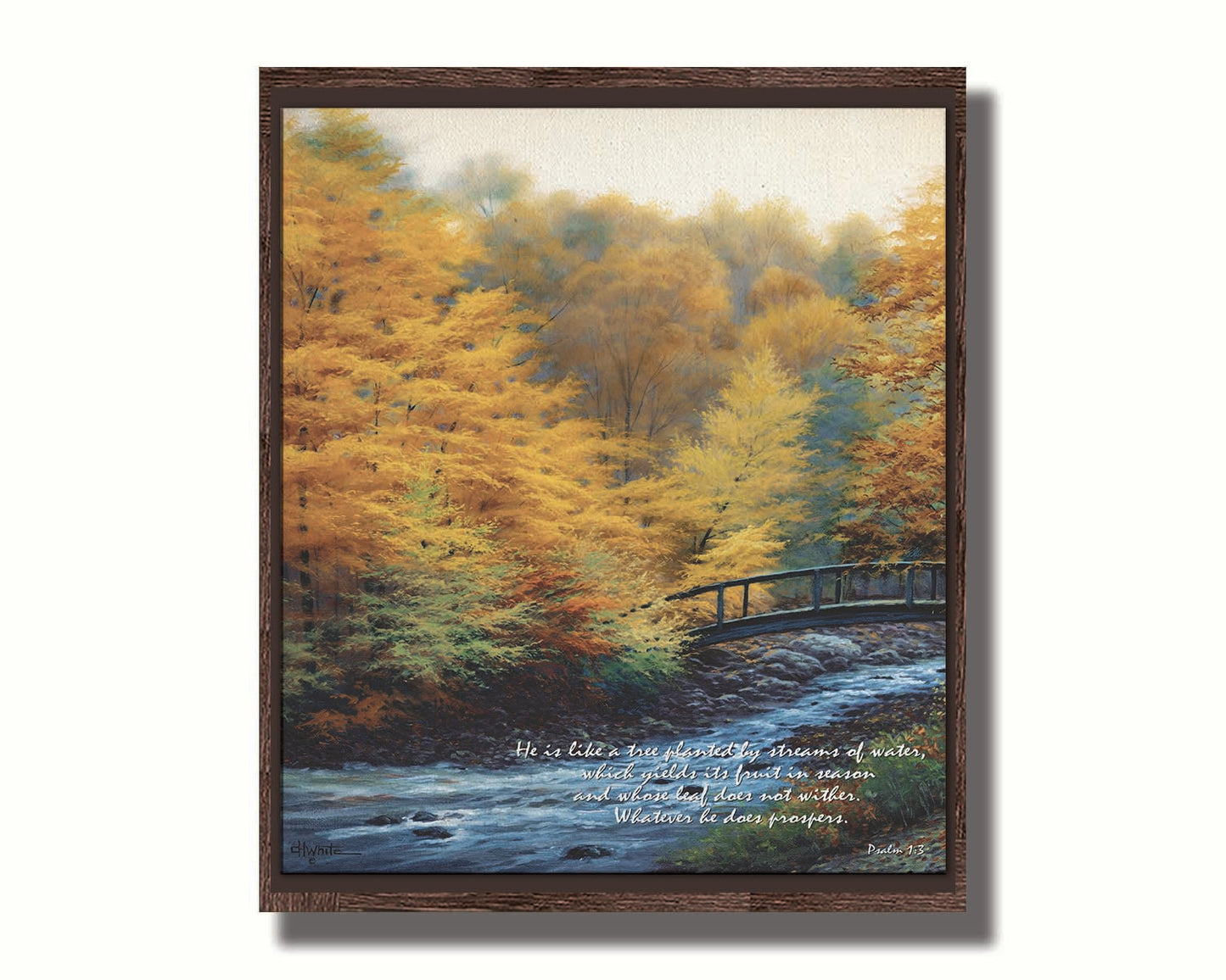 A painting of a forest stream, passing under an arched bridge. The trees are changing to yellow and orange for the fall season. The bottom right corner is overlaid with Psalm 1:3 in the Bible, reading "Psalm 1:3 from the Bible, reading "He is like a tree planted by streams of water, which yields its fruit in season and whose leaf does not wither. Whatever he does prospers." Printed on canvas in a float frame.