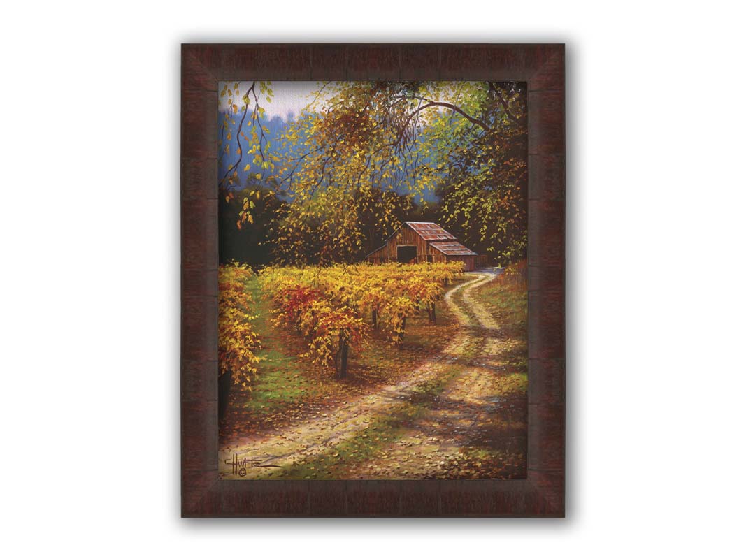 A painting of a dirt path passing a vineyard after harvest. At the far end of the path is a red barn. Printed on canvas and framed.