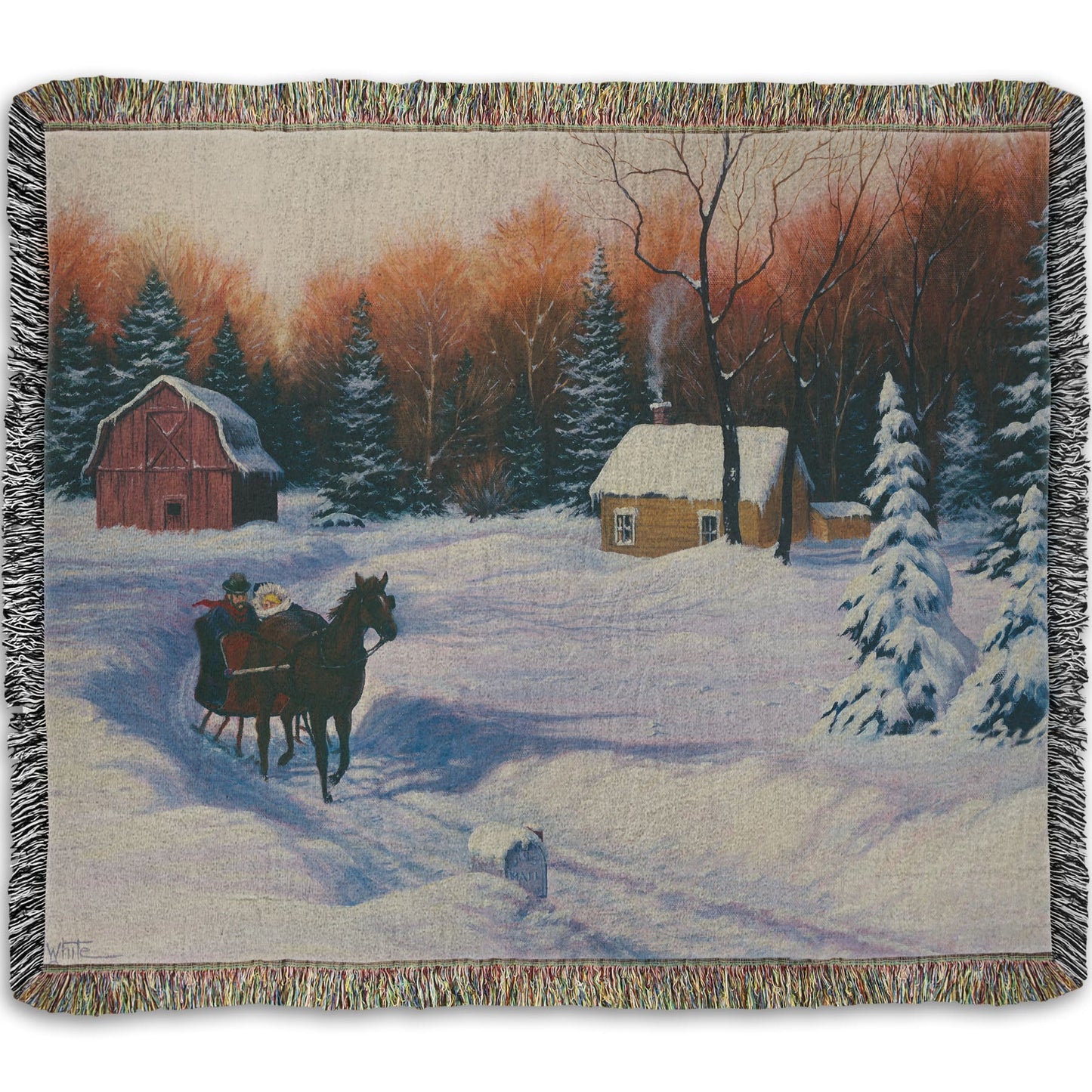A woven throw blanket designed with a winter scene with a horse-drawn carriage, snow-covered landscape, and red barn.