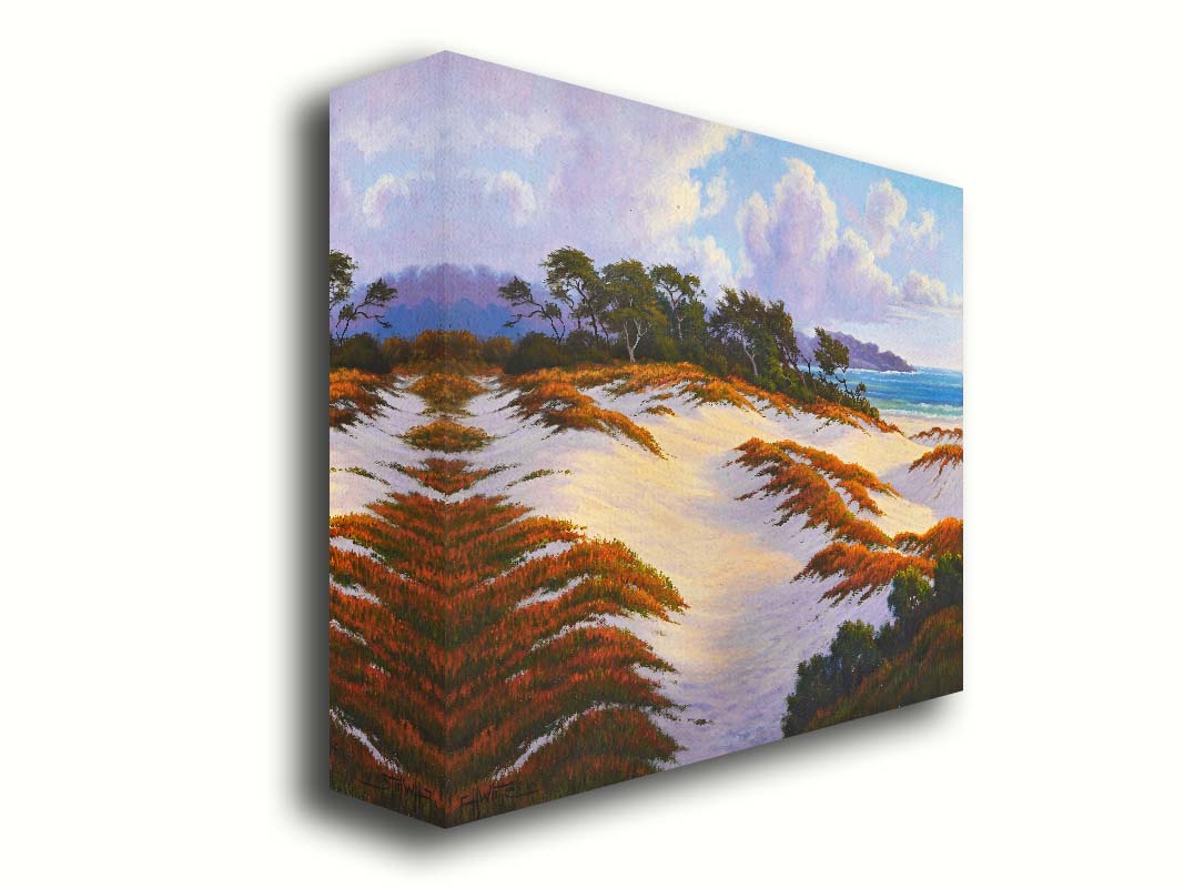 A painting of the Asilomar Dunes Natural Preserve in California. The white sand dune beach is complimented by red, green, and orange grasses. Printed on canvas.