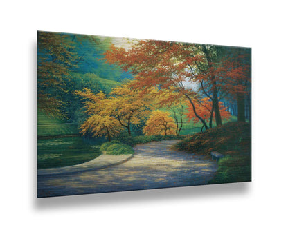 A painting of a paved garden path beside a pond, bordered by orange and yellow fall trees. Printed on metal.