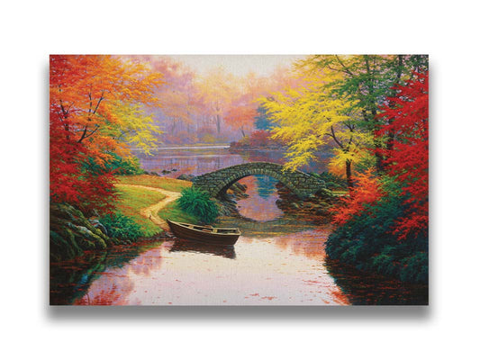 A painting of an idyllic fall scene, with colorful maples surrounding a river crossed by a small stone bridge. A rowboat is tied down near the bridge. Printed on canvas.