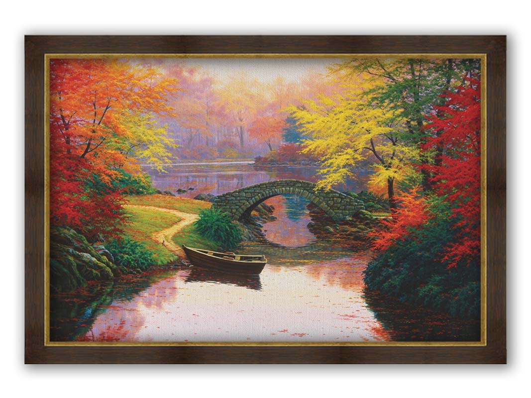 A painting of an idyllic fall scene, with colorful maples surrounding a river crossed by a small stone bridge. A rowboat is tied down near the bridge. Printed on canvas and framed.