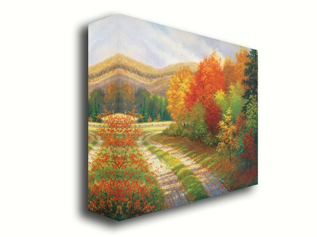 A painting of a forest in autumn, cut through by a gravel road curving into the distant fields and hills. Printed on canvas.