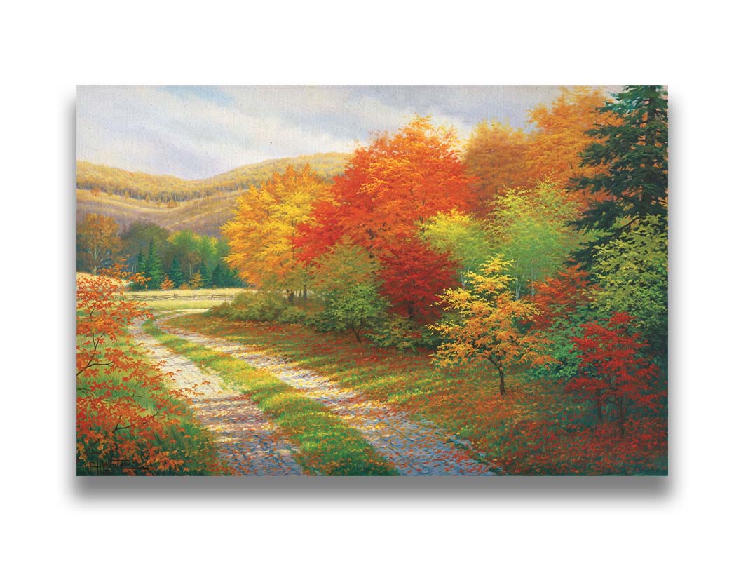 A painting of a forest in autumn, cut through by a gravel road curving into the distant fields and hills. Printed on canvas.