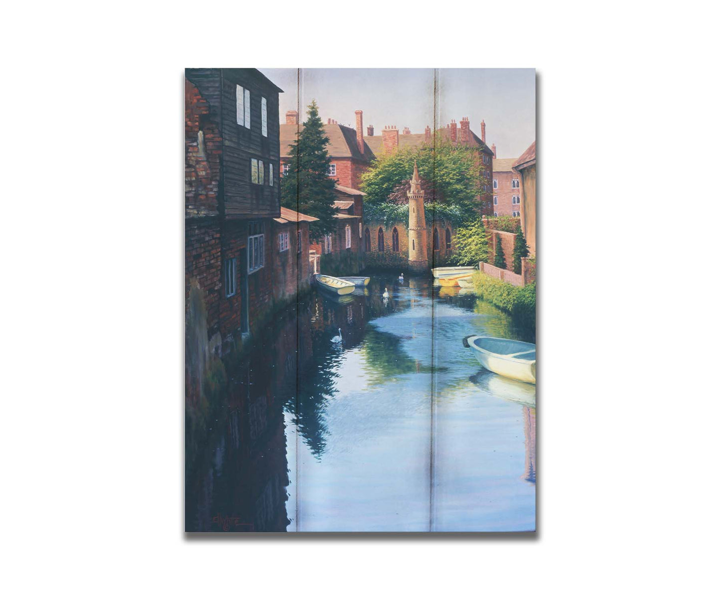 A painting of a canal in Canterbury in Kent, England. A few small row boats are docked along the waterway between historic red brick buildings. Printed on a box board.