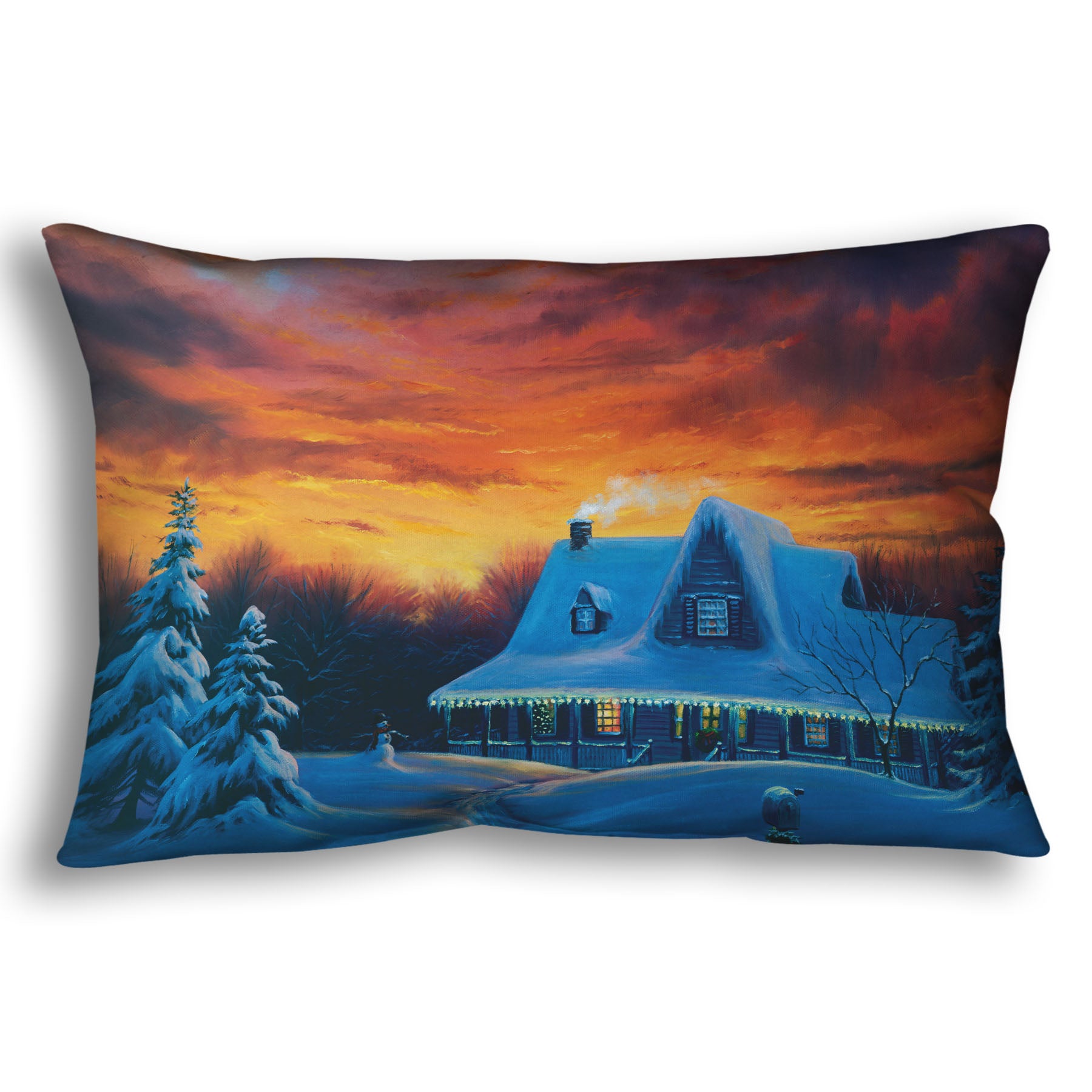 A throw pillow designed with a painting of a house, decorated for Christmas, covered in and surrounded by snow.