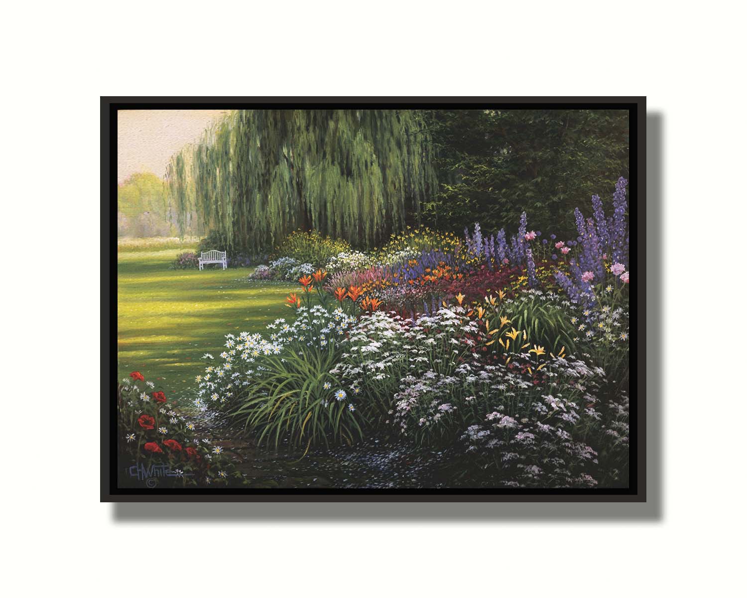 A painting of a garden filled with vibrant flowers, including lilies, carnations, poppies, and lavender. A serene white bench also sits under a weeping willow tree. Printed on canvas in a float frame.