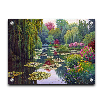 A painting of Claude Monet's garden at his home in Giverny, France. A pond dotted with lily pads is surrounded by weeping willows and colorful flower bushes in pinks, reds, yellows, and purples. Printed on acrylic.