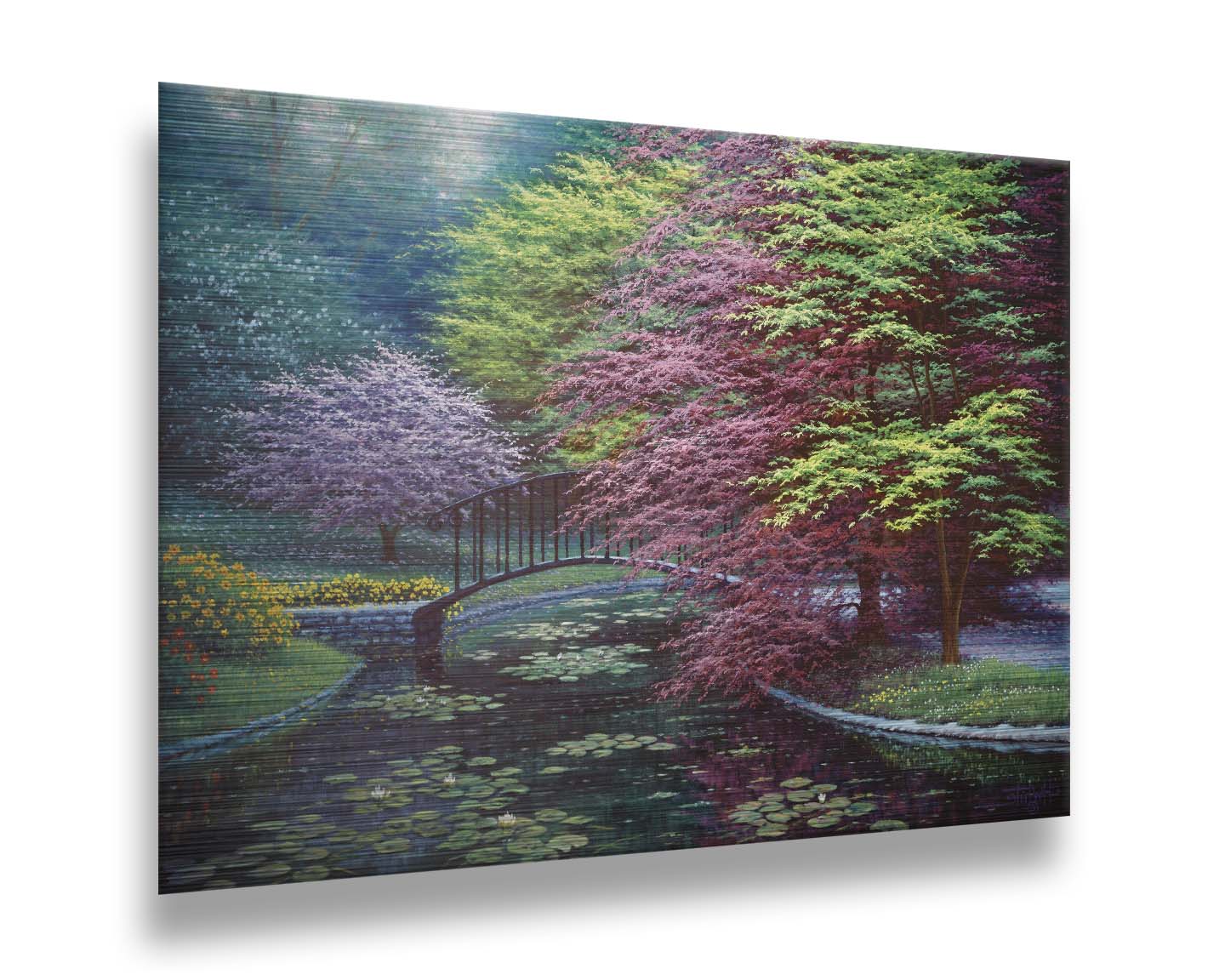 A painting of a peaceful garden pond covered in lily pads, and surrounded by vibrant red and yellow flowers, striking red maples, and blossoming white and pink trees. Printed on metal.