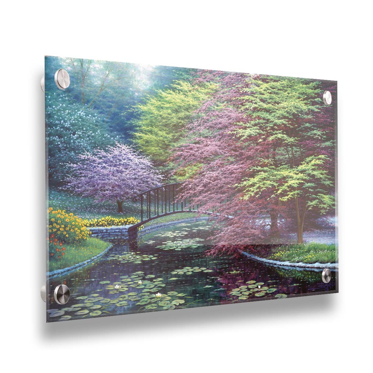 A painting of a peaceful garden pond covered in lily pads, and surrounded by vibrant red and yellow flowers, striking red maples, and blossoming white and pink trees. Printed on acrylic.