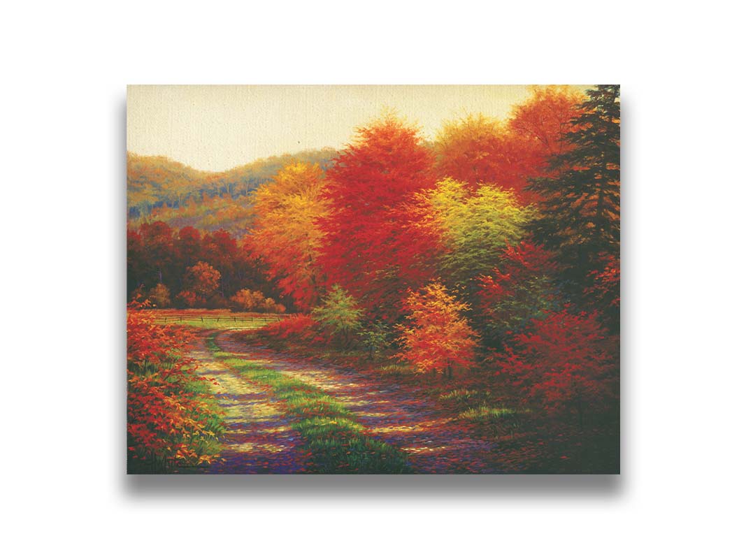 A painting of a forest in autumn, cut through by a gravel road curving into the distant fields and hills. Printed on canvas.