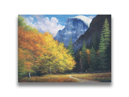 A painting of Yosemite National Park, with the iconic Half Dome batholith surrounded by wispy clouds. The fall foliage lines the trail to the summit. Printed on canvas.