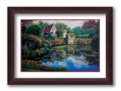 A painting of a pond covered in lily pads– bordered by a garden of flowers in every color, as well as an old stone wall covered in mosses and vines. Beyond it is a home with historic architecture, also supporting vines. The plants and structures are all well-maintained and not overgrown. Printed on paper, matted, and framed.