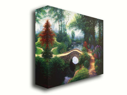 A painting of a serene garden path winding between flowers and trees. A stone bridge crosses over a tranquil pond inhabited by graceful swans. Printed on canvas.