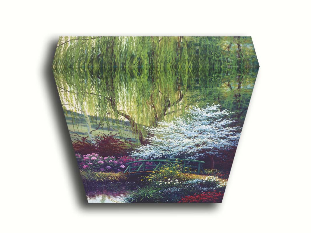 A painting of Claude Monet’s iconic water lily pond in Giverny, France, featuring a small bridge over the canal that brings water into the pond. It is surrounded by willow trees, trees with white and red blossoms, and a variety of flowers. Printed on canvas.