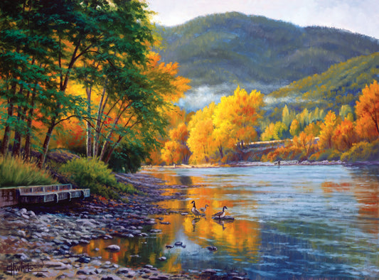 A landscape painting of the vibrant orange and yellow trees of the Rogue River in Oregon, with a few geese waddling in the shallows by the rocky shore. 