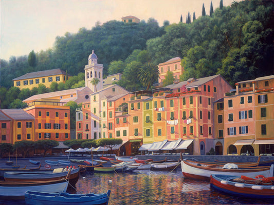 A painting of the colorful fishing town of Portofino. Many small boats are docked in the waters in the foreground, and the steep hills in the background are lush with trees.