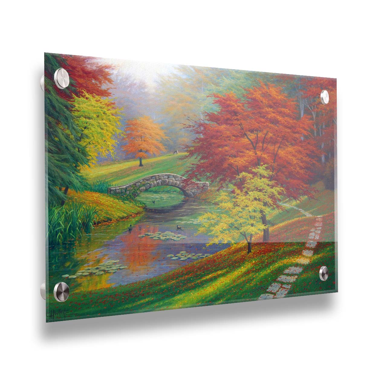 A painting of a fall park scene. Vibrant trees in hues of orange and red adorn the landscape while leaves gently fall. A stone bridge over a pond with lily pads and ducks. Printed on acrylic.