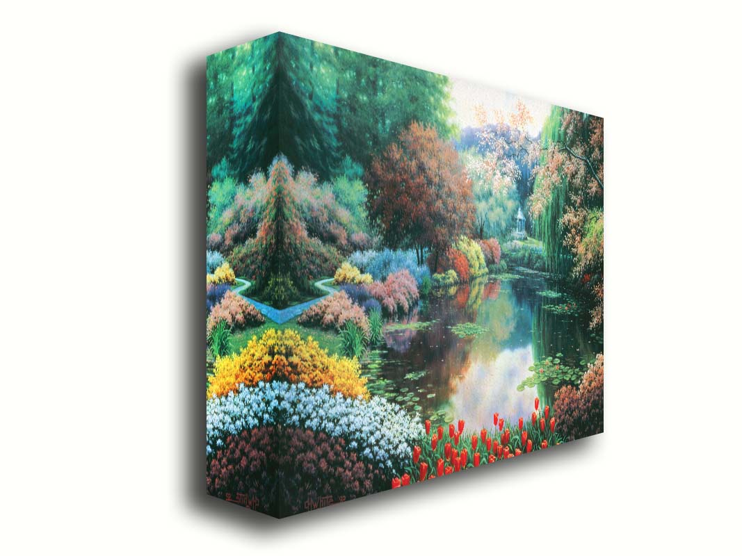 A painting of a landscape of a garden pond adorned with lily pads and vibrant flowers, with a gazebo in the distance. Printed on canvas.