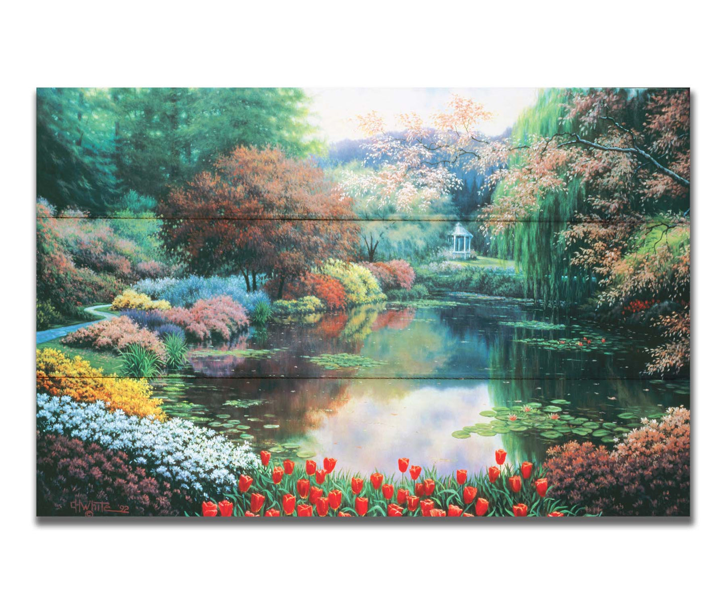 A painting of a landscape of a garden pond adorned with lily pads and vibrant flowers, with a gazebo in the distance. Printed on a box board.