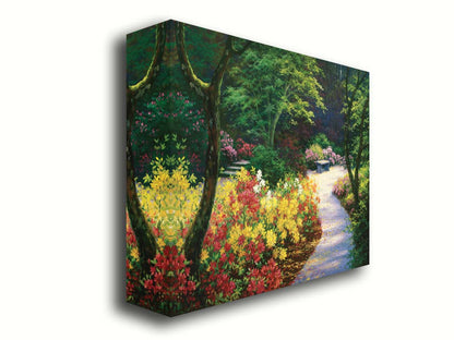 A painting of a lush garden path surrounded by vibrant red, yellow, and pink flowers and green trees. Printed on canvas.