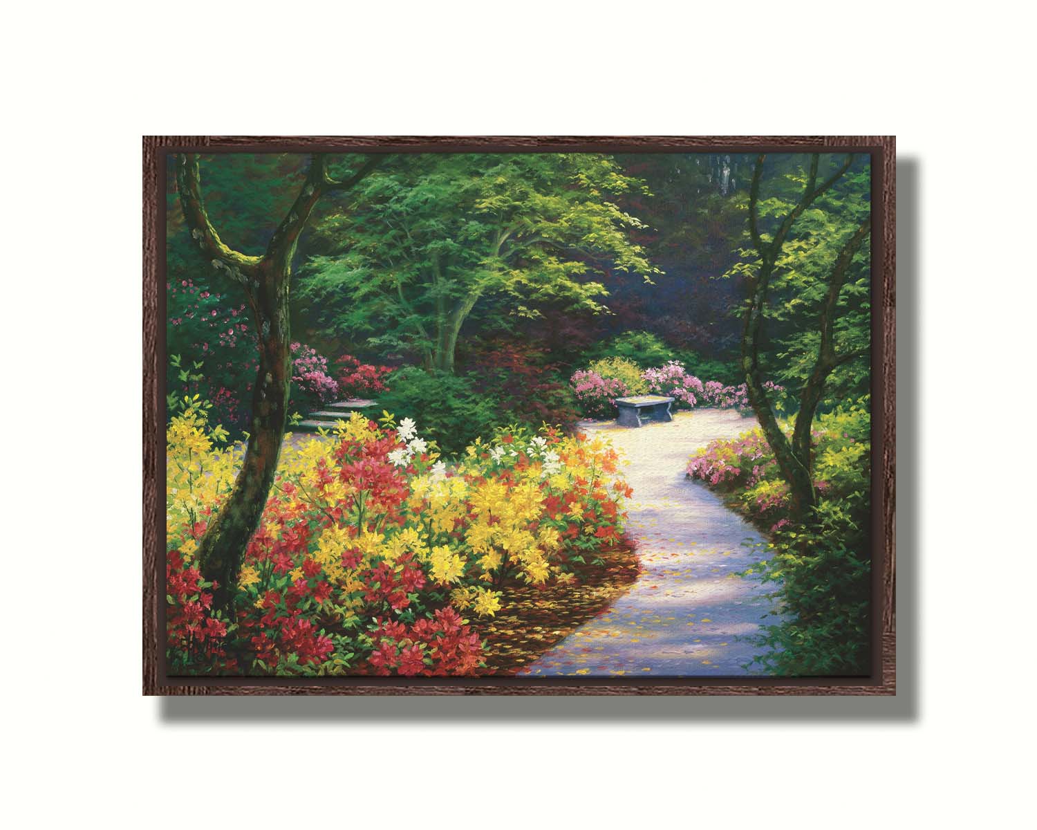 A painting of a lush garden path surrounded by vibrant red, yellow, and pink flowers and green trees. Printed on canvas in a float frame.