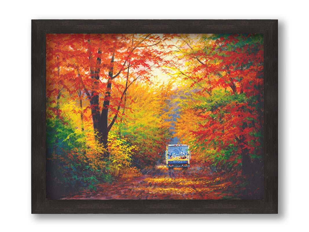 A painting of a road through the fall woods, with colorful leaves. A Schwan's food delivery truck drives away down the road. Printed on canvas and framed.