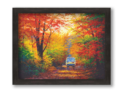 A painting of a road through the fall woods, with colorful leaves. A Schwan's food delivery truck drives away down the road. Printed on canvas and framed.