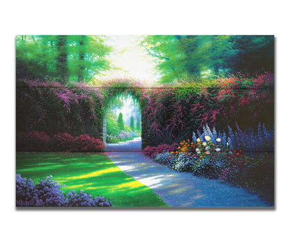 A painting of a garden path, adorned with vibrant flowerbeds. Around the garden stands a wall covered in flowering vines, with an archway for the path. Printed on a box  board.