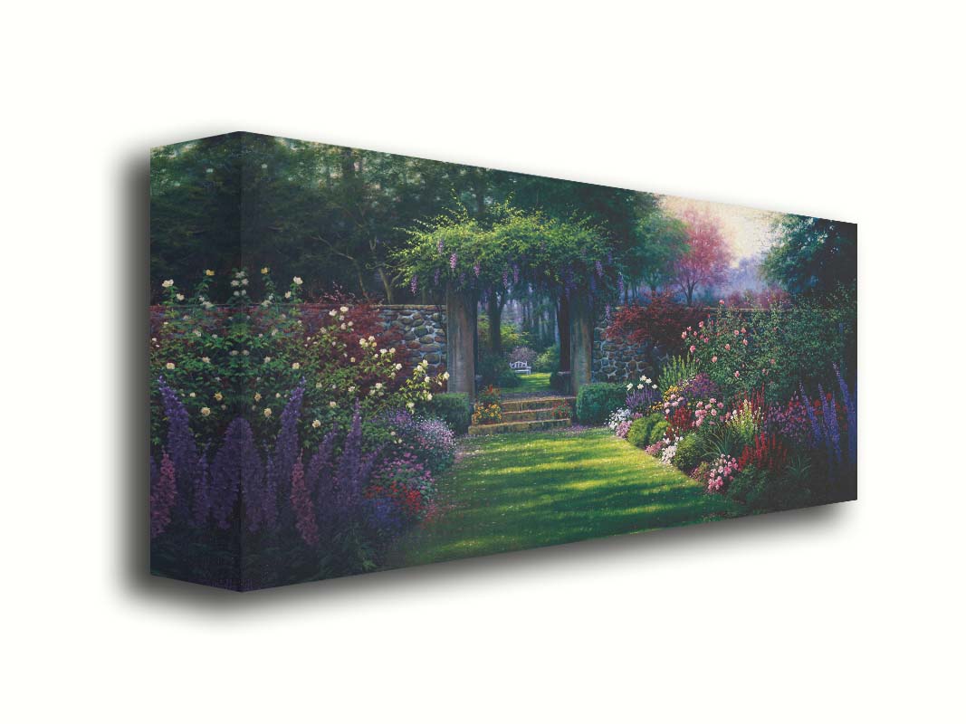 This painting depicts a grassy path leading through a tranquil garden filled with roses, carnations, lavender, and wisteria. The arch through the stone wall reveals a hidden grove of trees with a bench underneath. Printed on canvas.