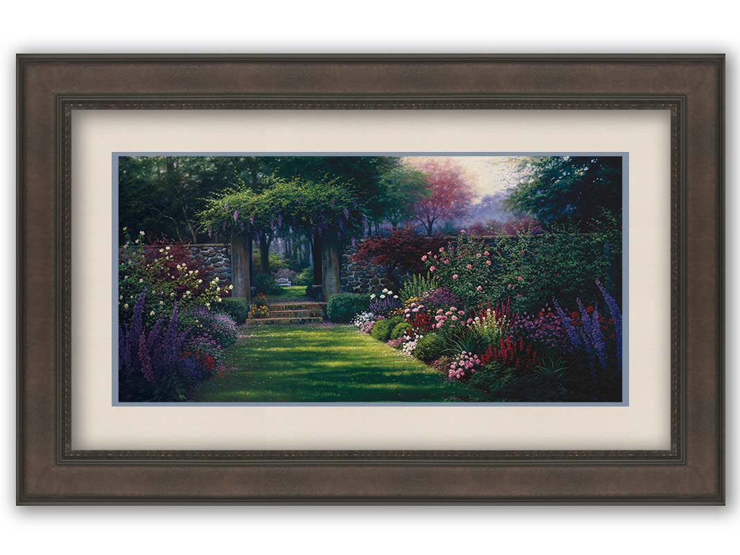 This painting depicts a grassy path leading through a tranquil garden filled with roses, carnations, lavender, and wisteria. The arch through the stone wall reveals a hidden grove of trees with a bench underneath. Printed on paper, matted, and framed.