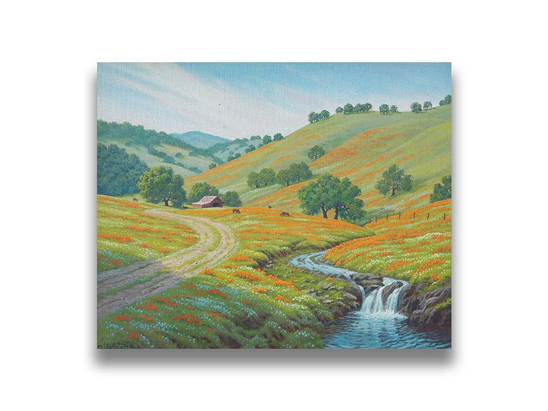 A painting of Round Valley at Mount Diablo in California. The wooded hills it is known for can be seen sprawling into the distance, with meadows of orange and white flowers. A small creek carves through the scene in parallel to a dirt path, leading up to a barn and cows. Printed on canvas.