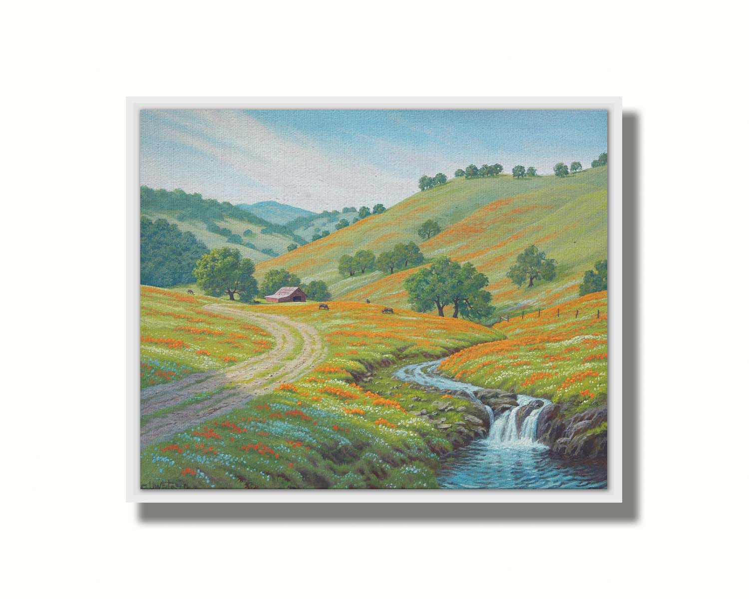 A painting of Round Valley at Mount Diablo in California. The wooded hills it is known for can be seen sprawling into the distance, with meadows of orange and white flowers. A small creek carves through the scene in parallel to a dirt path, leading up to a barn and cows. Printed on canvas in a float frame.