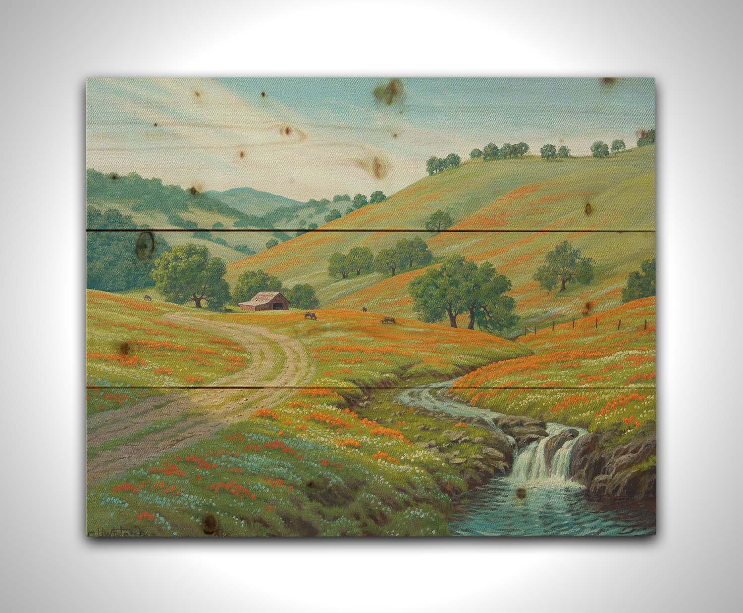 A painting of Round Valley at Mount Diablo in California. The wooded hills it is known for can be seen sprawling into the distance, with meadows of orange and white flowers. A small creek carves through the scene in parallel to a dirt path, leading up to a barn and cows. Printed on a wood pallet.