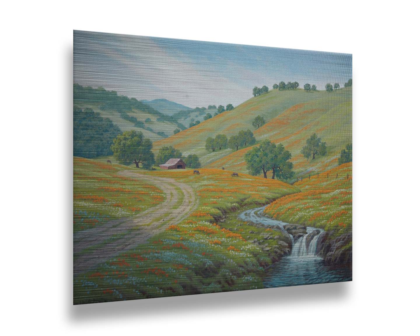 A painting of Round Valley at Mount Diablo in California. The wooded hills it is known for can be seen sprawling into the distance, with meadows of orange and white flowers. A small creek carves through the scene in parallel to a dirt path, leading up to a barn and cows. Printed on metal.