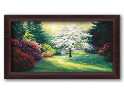 A painting of a park during a spring morning. Bushes and trees are blossoming with colorful flowers, and dark deep evergreens which contrast the warm morning light. Printed on canvas and framed.