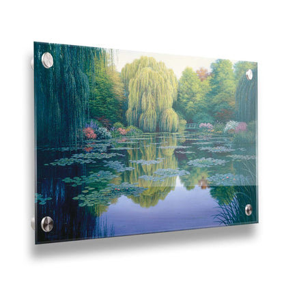 A painting of the pond at Claude Monet's garden at Giverny, France. Lily pads are scattered all across the pond, which is surrounded by willow trees and flower bushes. Printed on acrylic.