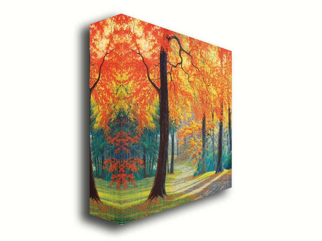 A painting of a gravel road through a fall forest. Sunbeams shine through evergreens and vibrant orange trees. Printed on canvas.